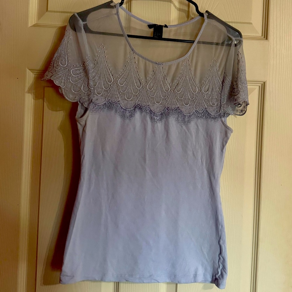 Light blue tank top with sheer lace top panel sized small fits med H&M
